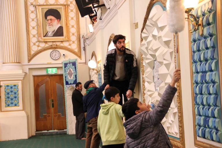 Photo Gallery of the symbolic dusting at the Islamic Centre of England